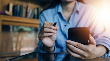 Business team present. professional investor working new start up project. Finance managers meeting.Digital tablet docking screen computer design smart phone using, in morning lightの写真素材