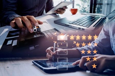 Customer evaluation feedback.men in suit Giving Positive Review for Client's Satisfaction Surveys.giving a five star rating. Service rating, satisfaction conceptの写真素材