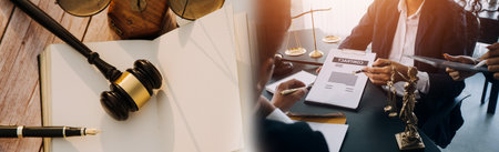 Business and lawyers discussing contract papers with brass scale on desk in office. Law, legal...