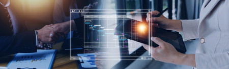 Analyst working with computer in Business Analytics and Data Management System to make report with...