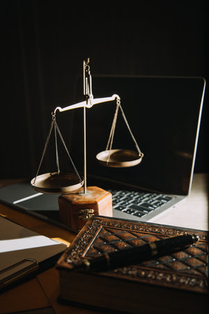 Business and lawyers discussing contract papers with brass scale on desk in office. Law, legal...