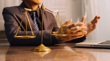 Justice and law concept.Male judge in a courtroom with the gavel, working with, computer and docking...