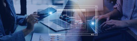 Analyst working with computer in Business Analytics and Data Management System to make report with...