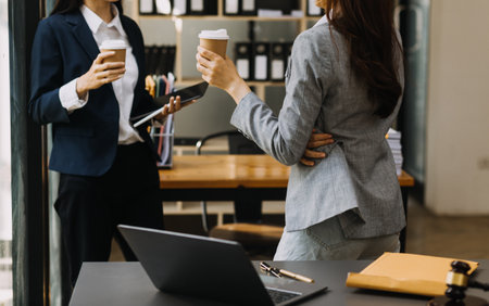 Male lawyer working with contract papers and wooden gavel on tabel in courtroom. justice and law ,attorney, court judge, concept.の写真素材
