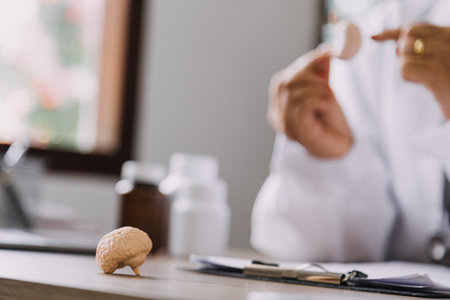 Homecare nursing service and elderly people cardiology healthcare. Close up of young hispanic female doctor nurse check mature caucasian man patient heartbeat using stethoscope during visitの写真素材