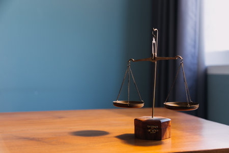 Business and lawyers discussing contract papers with brass scale on desk in office. Law, legal...
