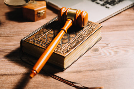 Business and lawyers discussing contract papers with brass scale on desk in office. Law, legal services, advice, justice and law concept picture with film grain effectの写真素材