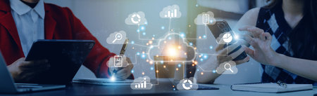 man use Laptop with cloud computing diagram show on hand. Cloud technology. Data storage. Networking...