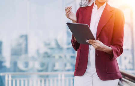 Working together on project. Two young business colleagues working on computerの写真素材