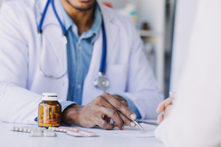 Male Doctor writing out RX prescription, copy space, consent contract sign prescribe a remedy healthy lifestyle healthcare Online medical service conceptの写真素材