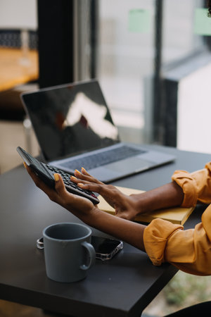 Entrepreneurs and business people conference in modern meeting room, happy multiracial coworkers have fun cooperating working together at office meeting, asian teamwork conceptの写真素材