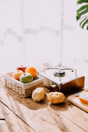 balanced diet, cooking, culinary and food concept - close up of vegetables, fruits and meat on wooden tableの写真素材