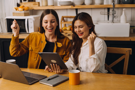 Entrepreneurs and business people conference in modern meeting room, happy multiracial coworkers have fun cooperating working together at office meeting, asian teamwork conceptの写真素材