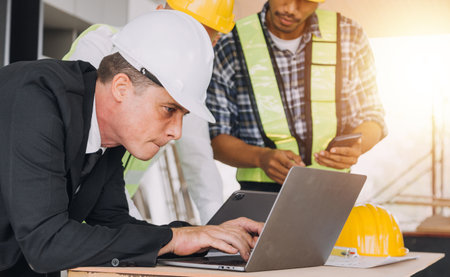 Architect concept, Architects working with blueprints in the office, Vintage Effectの写真素材