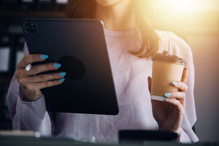 Attractive smiling young asian business woman work at home office, Asian woman working on laptop...