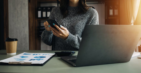 Attractive smiling young asian business woman work at home office, Asian woman working on laptop...