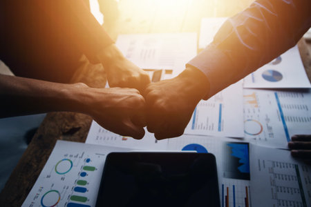 Business handshake for teamwork of business merger and acquisition,successful negotiate,hand shake,two businessman shake hand with partner to celebration partnership and business deal conceptの写真素材