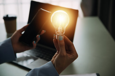 woman Hand holding Light bulb Global Internet connection. Business global internet connection...