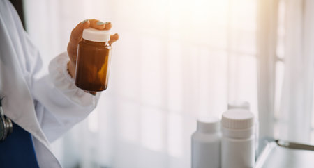 Male Doctor writing out RX prescription, copy space, consent contract sign prescribe a remedy healthy lifestyle healthcare Online medical service conceptの写真素材
