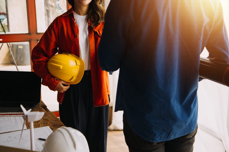Two business man construction site engineer. Engineering objects on workplace with partners...