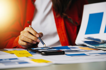 Close up ux developer and ui designer use augmented reality brainstorming about mobile app interface wireframe design on desk at modern office.Creative digital development agencyの写真素材