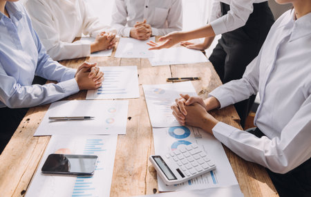 Businesswoman or accountant working Financial investment on calculator, calculate, analyze business and marketing growth on financial document data graph, Accounting, Economic, commercial concept.mの写真素材