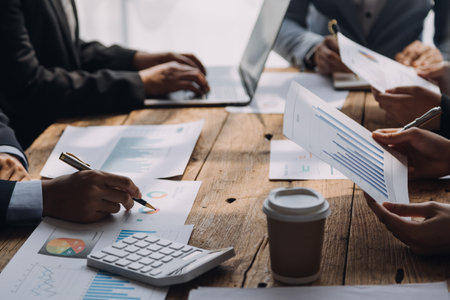 Businesswoman or accountant working Financial investment on calculator, calculate, analyze business and marketing growth on financial document data graph, Accounting, Economic, commercial concept.mの写真素材