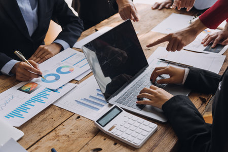 Businesswoman or accountant working Financial investment on calculator, calculate, analyze business and marketing growth on financial document data graph, Accounting, Economic, commercial concept.mの写真素材