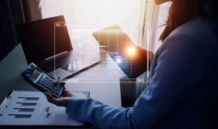 Project manager working with Gantt chart schedule to plan tasks and deliverables. Scheduling activities with a planning software, Corporate strategy for finance, operations, sales, marketing.の写真素材