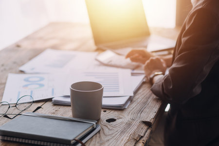 Business Documents, Auditor businesswoman checking searching document legal prepare paperwork or report for analysis TAX time,accountant Documents data contract partner deal in workplace officeの写真素材