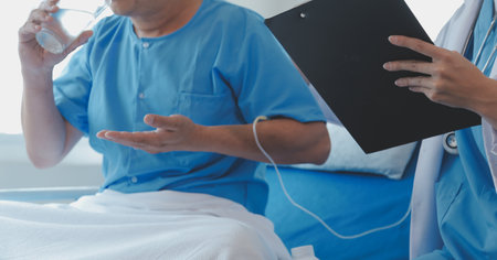 Women Asian doctors hold the patient hand and encourage and provide medical advice While checking the patient health in bed. Concept of Care and compassion, antenatal care, Threatened abortionの写真素材