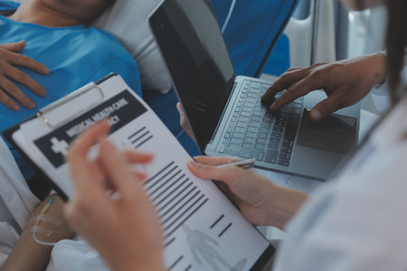 Women Asian doctors hold the patient hand and encourage and provide medical advice While checking...