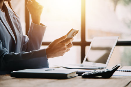 Business Documents, Auditor businesswoman checking searching document legal prepare paperwork or report for analysis TAX time,accountant Documents data contract partner deal in workplace officeの写真素材