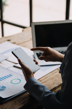 Business Documents, Auditor businesswoman checking searching document legal prepare paperwork or report for analysis TAX time,accountant Documents data contract partner deal in workplace officeの写真素材