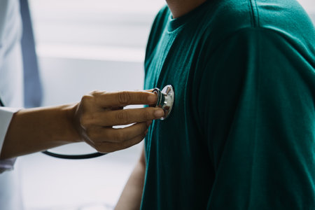close up of patient and doctor taking notes