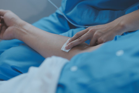 Women Asian doctors hold the patient hand and encourage and provide medical advice While checking...
