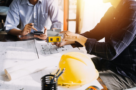 Architect concept, Architects working with blueprints in the office, Vintage Effectの写真素材