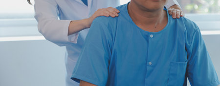 Patient doing some special exercises under supervision in a room