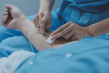 Injured patient showing doctor broken wrist and arm with bandage in hospital office or emergency room. Sprain, stress fracture or repetitive strain injury in hand. Nurse helping customer. First aid.の写真素材