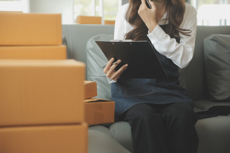 Business woman start up small business entrepreneur SME success .freelance woman working at home...