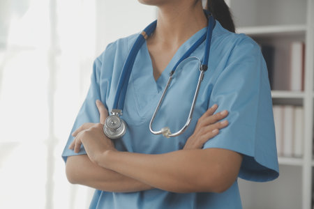 Healthcare and medical concept. Medicine doctor with stethoscope in hand and Patients come to the hospital background.の写真素材