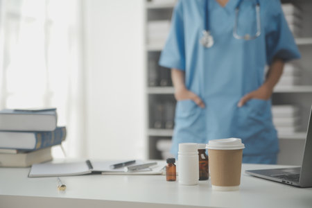 Healthcare and medical concept. Medicine doctor with stethoscope in hand and Patients come to the hospital background.の写真素材