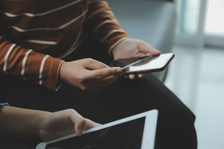 Close up of woman hand using credit card and laptop for payment and online shopping, Online shopping, payments digital banking, E-commerce concept.の写真素材