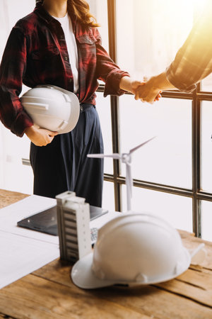 Architectural Office desk background construction project ideas concept, With drawing equipment with mining lightの写真素材