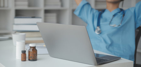 Male Doctor writing out RX prescription, copy space, consent contract sign prescribe a remedy healthy lifestyle healthcare Online medical service conceptの写真素材