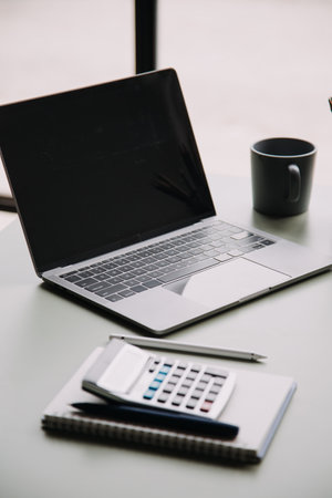 Entrepreneur Asian businessman and businesswoman discussing new business project in tablet in modern...