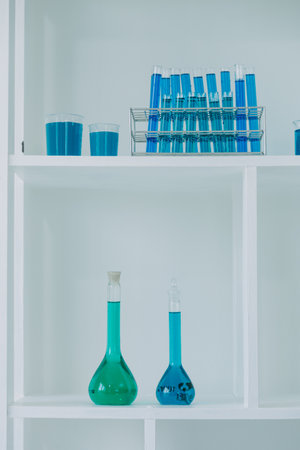 microscope with lab glassware, science laboratory research and development conceptの写真素材