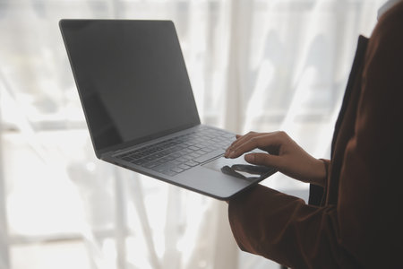 Attractive smiling young asian business woman work at home office, Asian woman working on laptop...