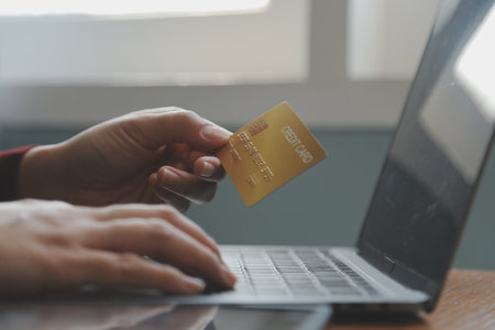 Women holding credit card and using smartphones at home.Online shopping, internet banking, store...