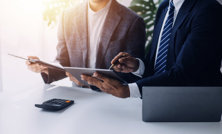 Business Documents, Auditor businesswoman checking searching document legal prepare paperwork or report for analysis TAX time,accountant Documents data contract partner deal in workplace officeの写真素材